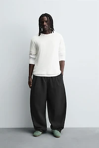 BALLOON FIT PLEATED PANTS