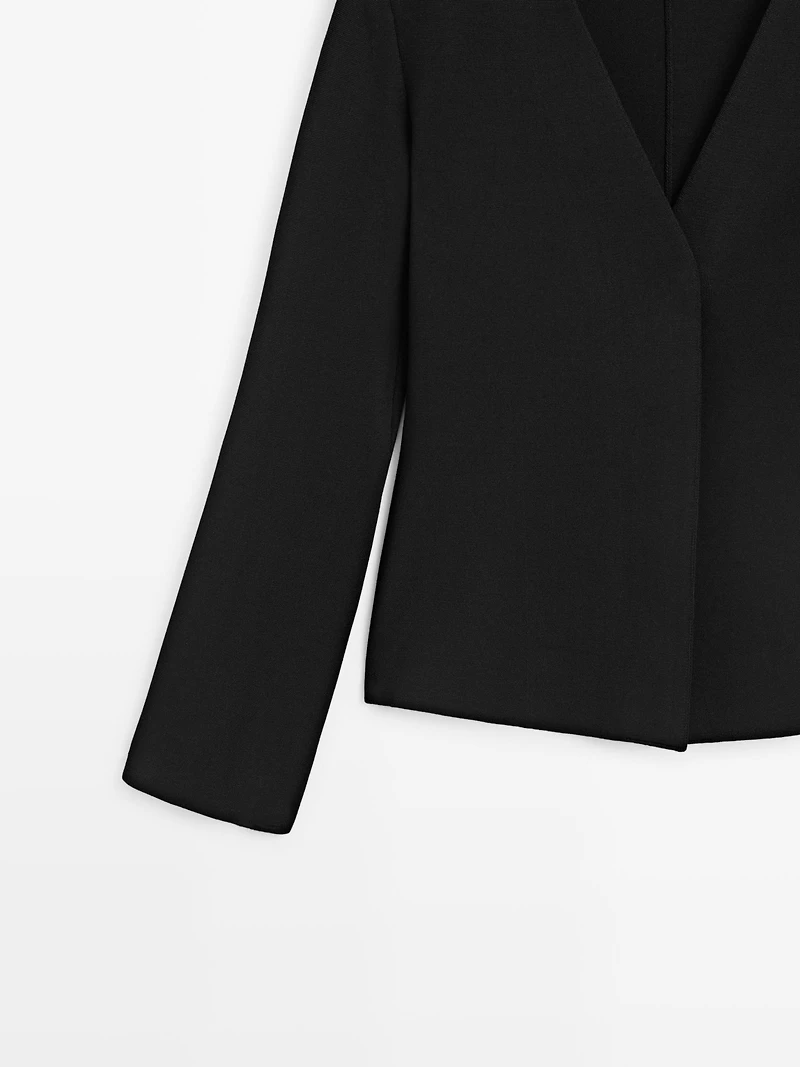 Blazer en maille à col V et fermeture
