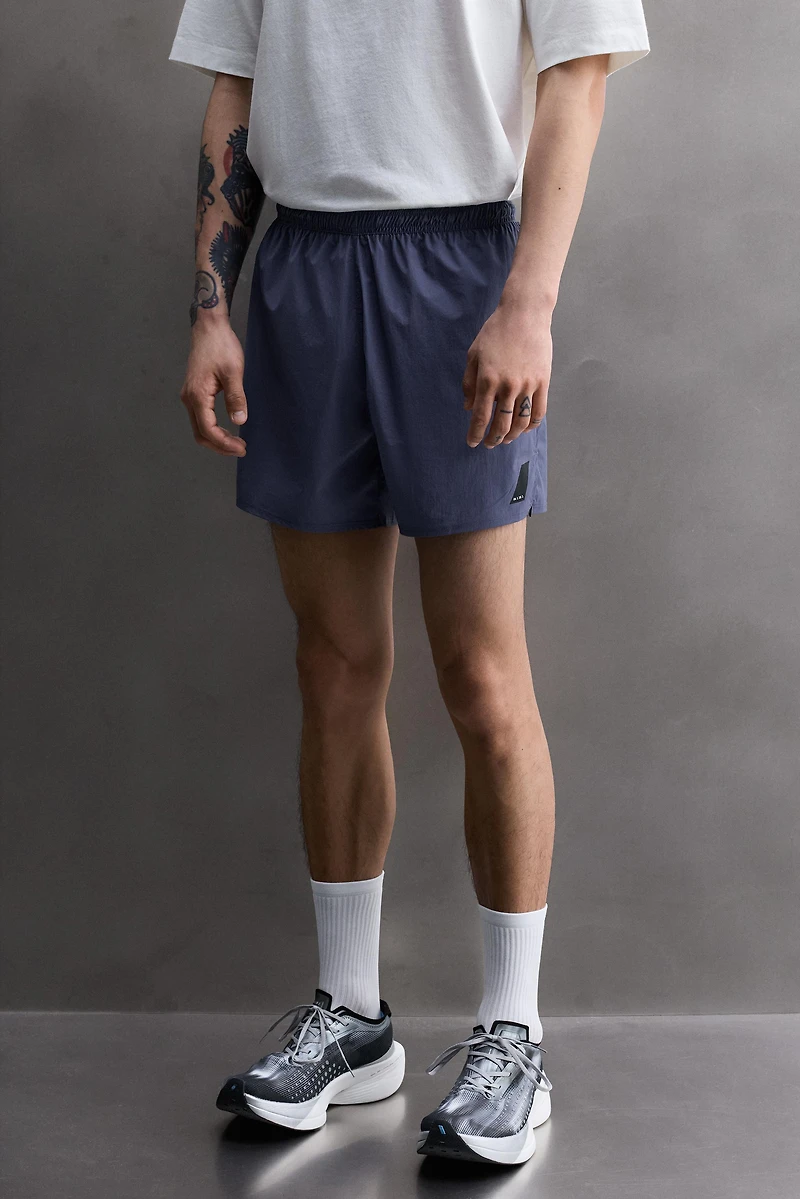 SHORT LÉGER DE RUNNING 5"