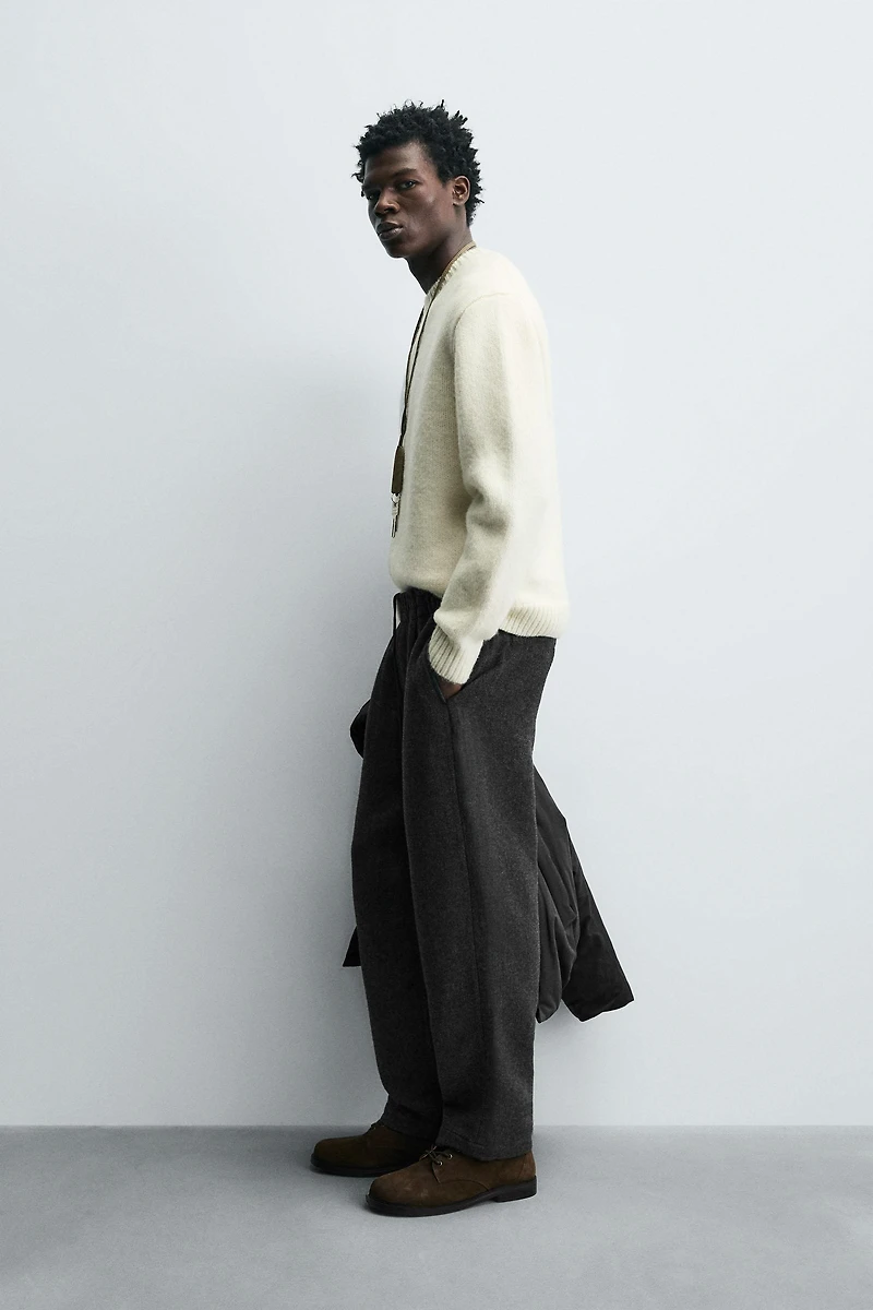 PLEATED WOOL PANTS