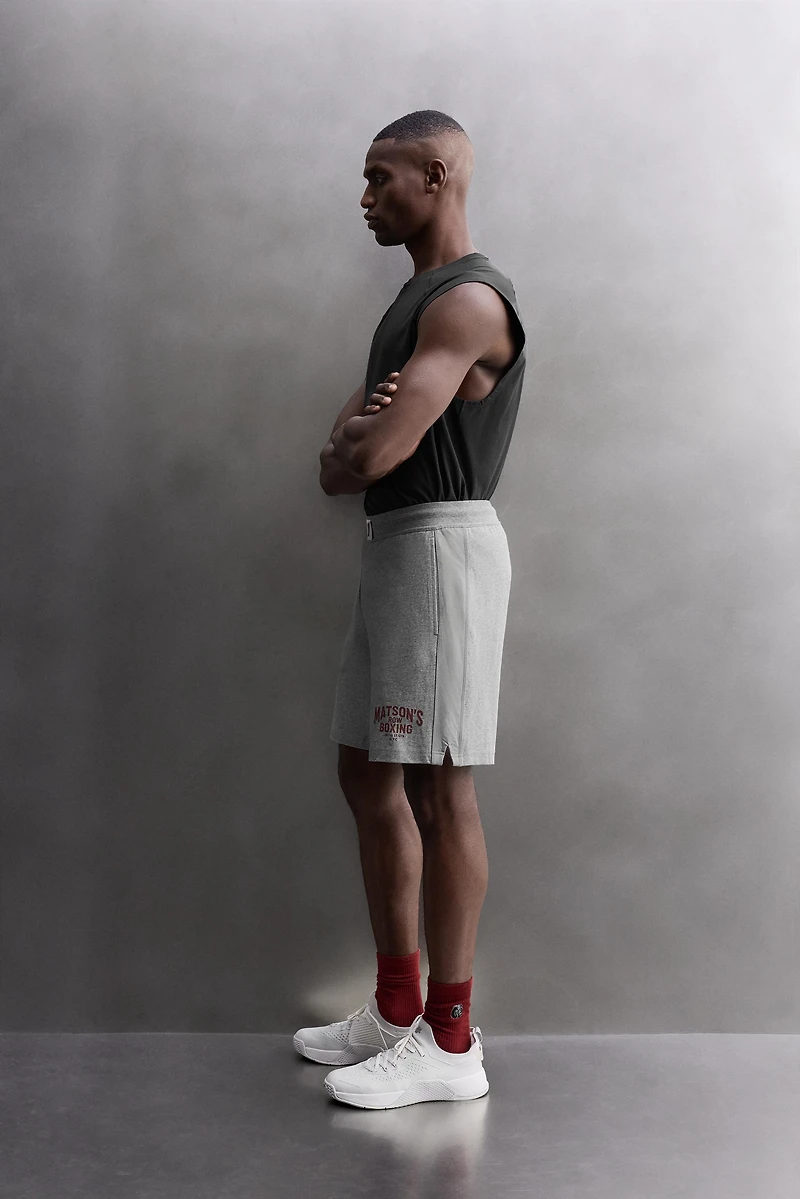 EMBROIDERED SIDE STRIPE 9" SHORTS