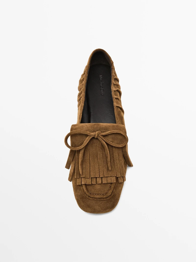 Split suede loafers with fringing