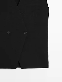Veste sans manches longue à détail croisé