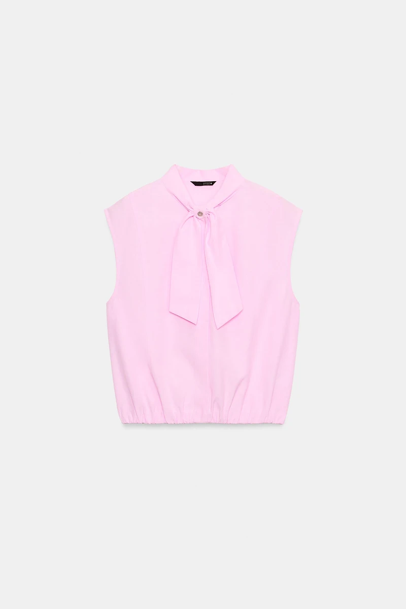 BLOUSE À NŒUD SANS MANCHES