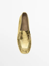 Gold penny loafers