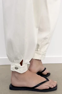 TRF MID-RISE BALLOON JEANS WITH BUTTON TABS