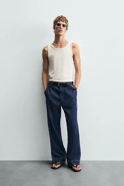 EMBROIDERED BAND DETAIL JEANS