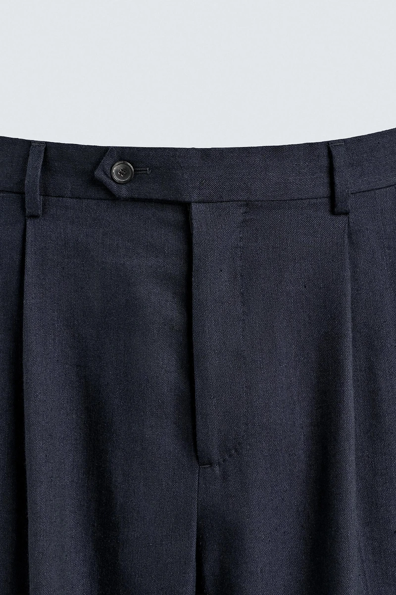 100% WOOL RELAXED FIT PLEATED PANTS