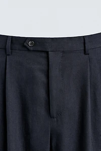 100% WOOL RELAXED FIT PLEATED PANTS