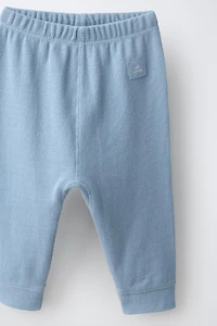 ENSEMBLE T-SHIRT CROISÉ ET LEGGING GAUFRÉ