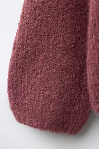 GILET EN MAILLE AVEC NŒUD SATIN