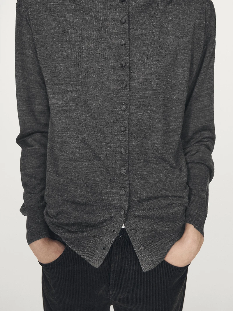 Mock turtleneck cardigan with covered buttons