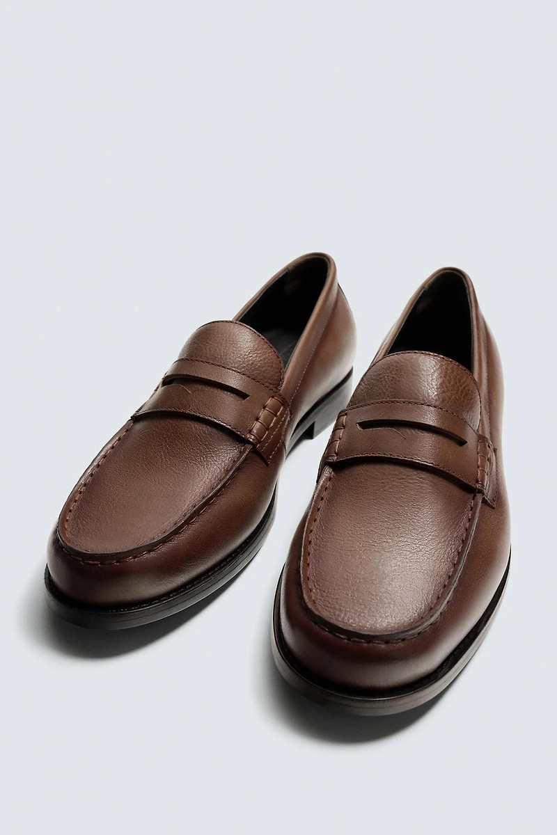 MOCASSINS EN CUIR À MASQUE