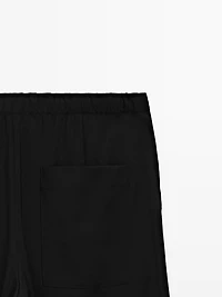 Wool sarouel trousers with tie detail