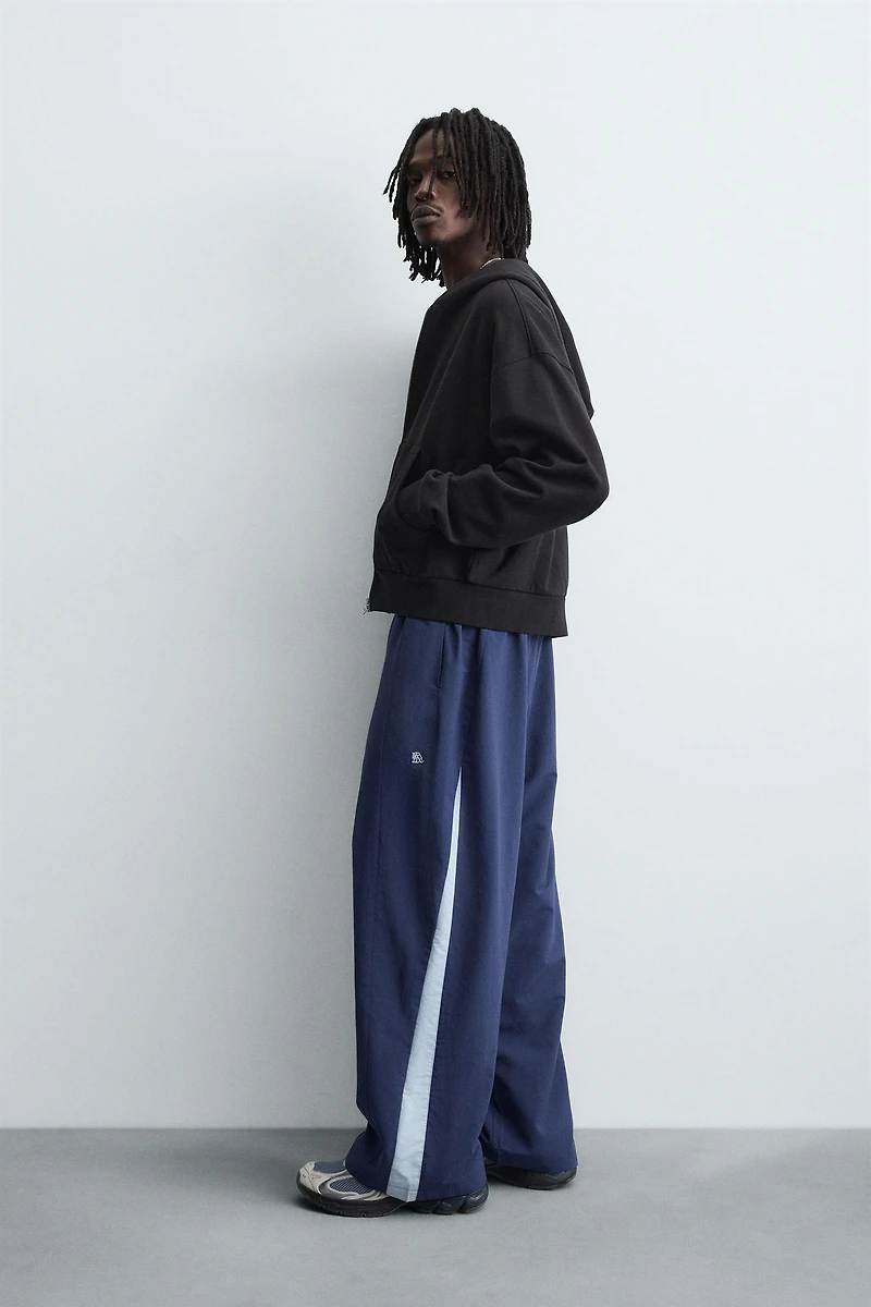 PANTALON TECHNIQUE À BANDES