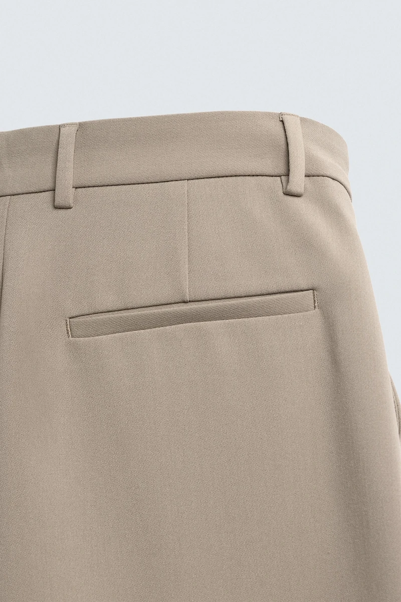 PANTALON RELAXED FIT À PLIS