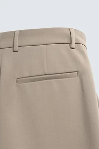 PANTALON RELAXED FIT À PLIS