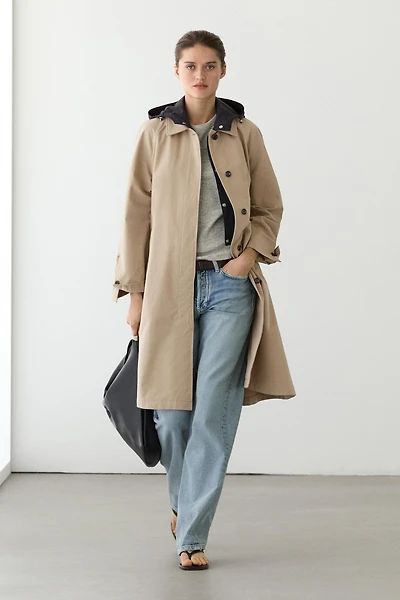 Cape trench coat with detachable hood