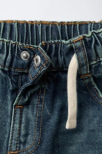 DISTRESSED BALLOON JEANS