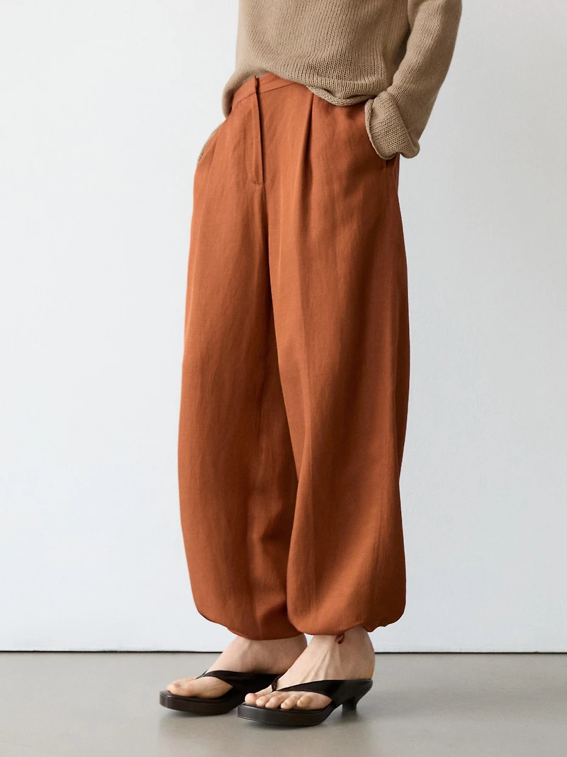 Flowing trousers with tie detail