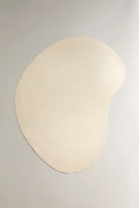 PLAIN IRREGULAR WOOL AREA RUG