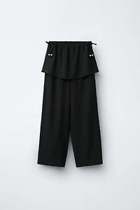 PANTALON TEXTURÉ JAMBES LARGES JUPE