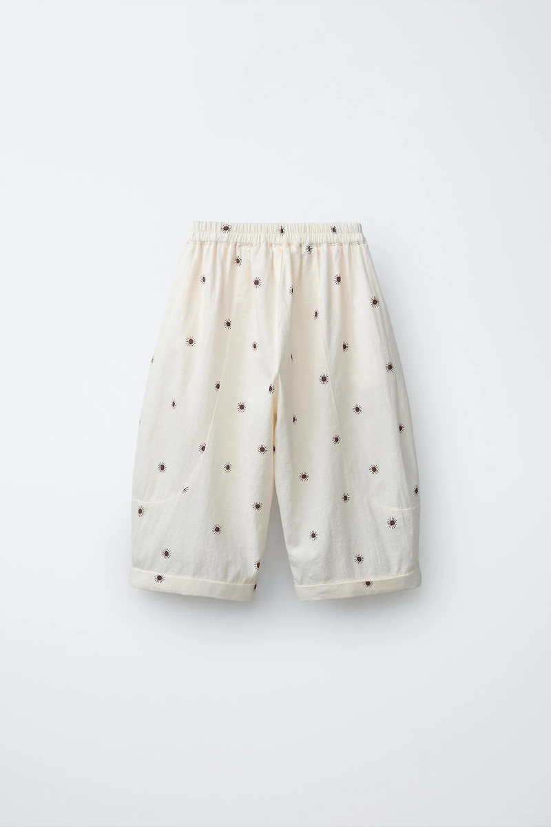 TEXTURED SUN PRINT BAGGY PANTS