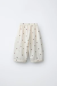 TEXTURED SUN PRINT BAGGY PANTS