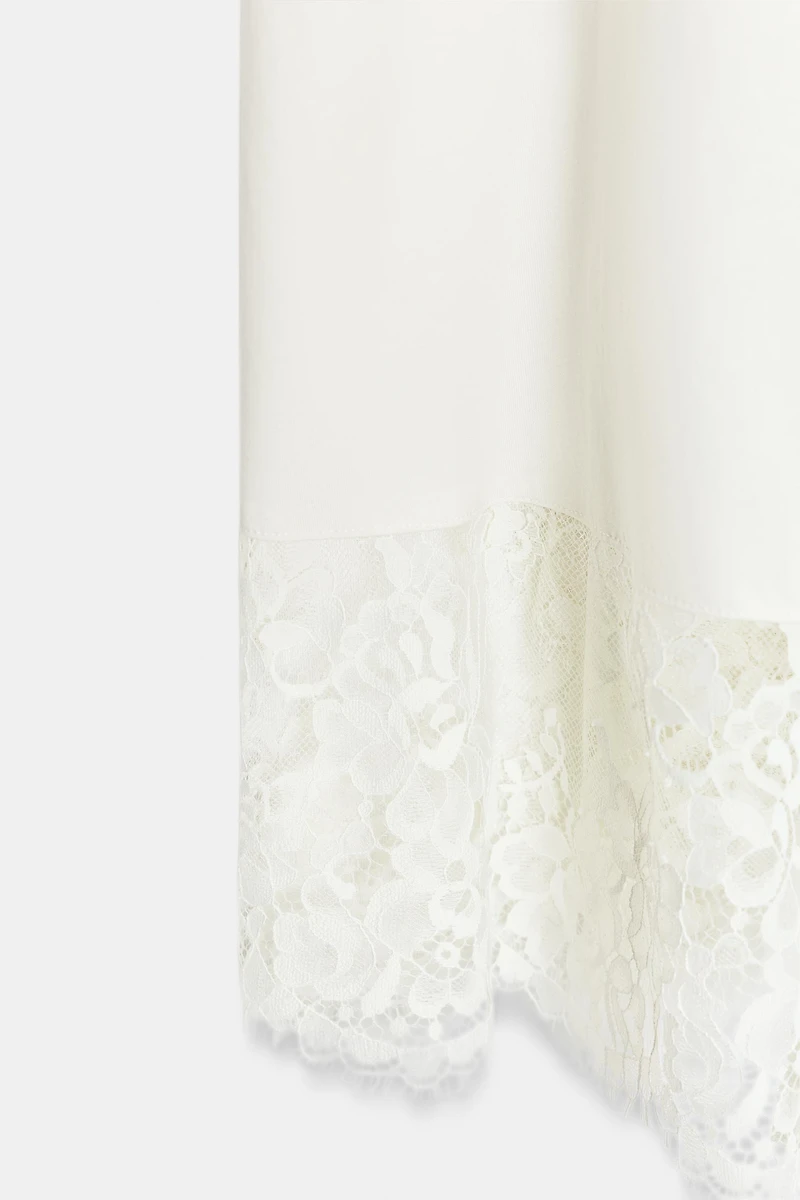 VOLUMINOUS LACE MIDI SKIRT