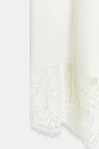 VOLUMINOUS LACE MIDI SKIRT