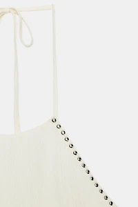 STUDDED RUFFLE HALTER TOP