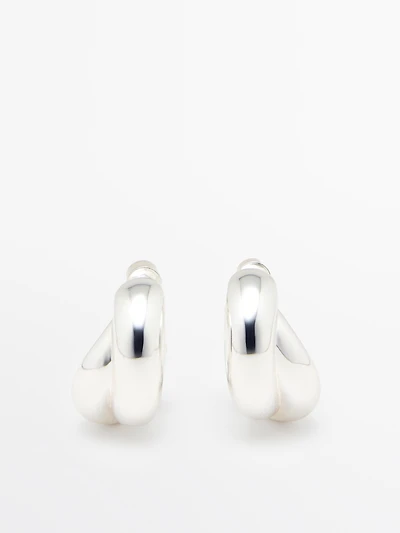 Boucles d’oreilles anneaux enveloppantes