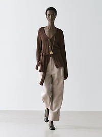 Suit trousers with buckle detail