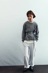 KNIT SWEATER WITH LACE-UP OPEN BACK