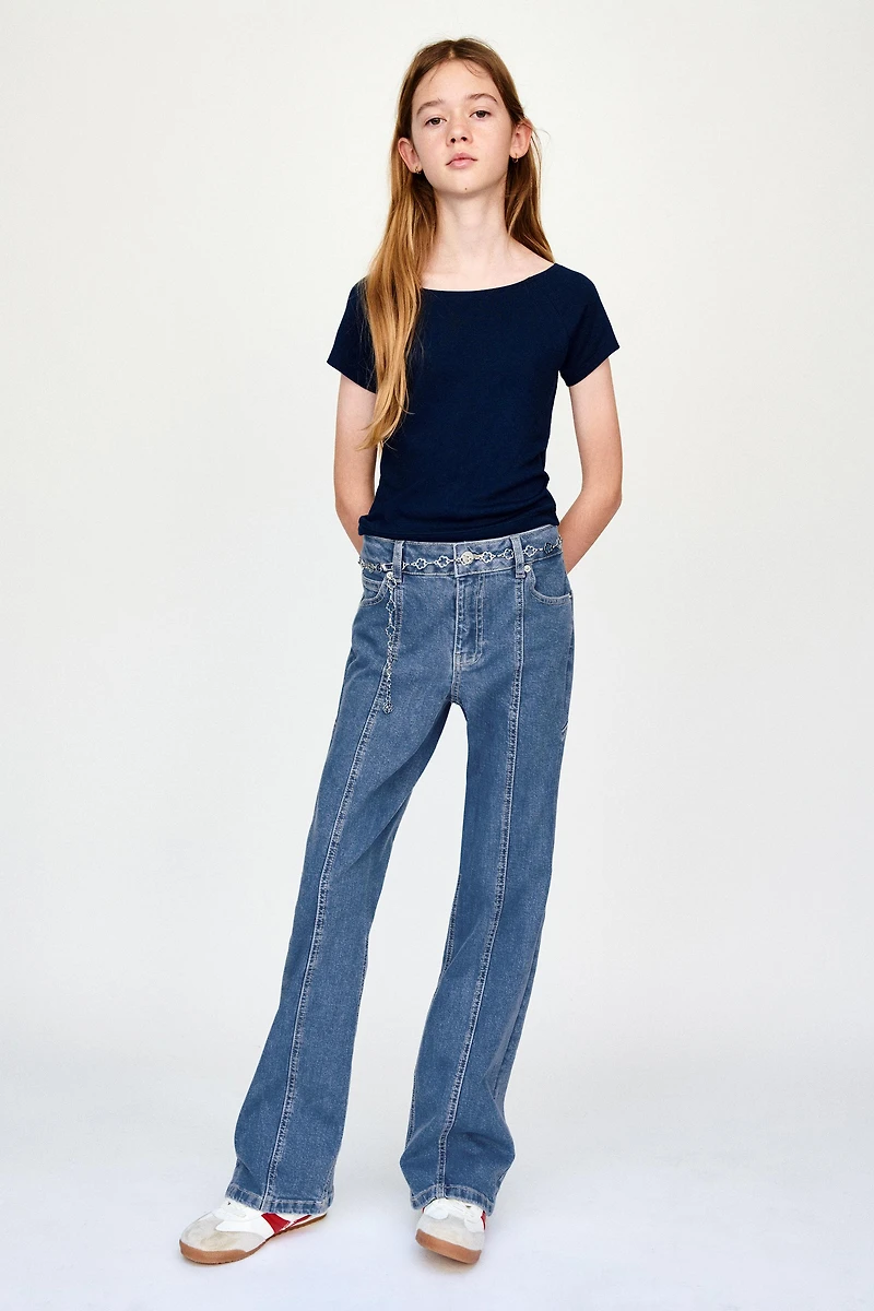 BOOTCUT JEANS WITH STAR PATCHES
