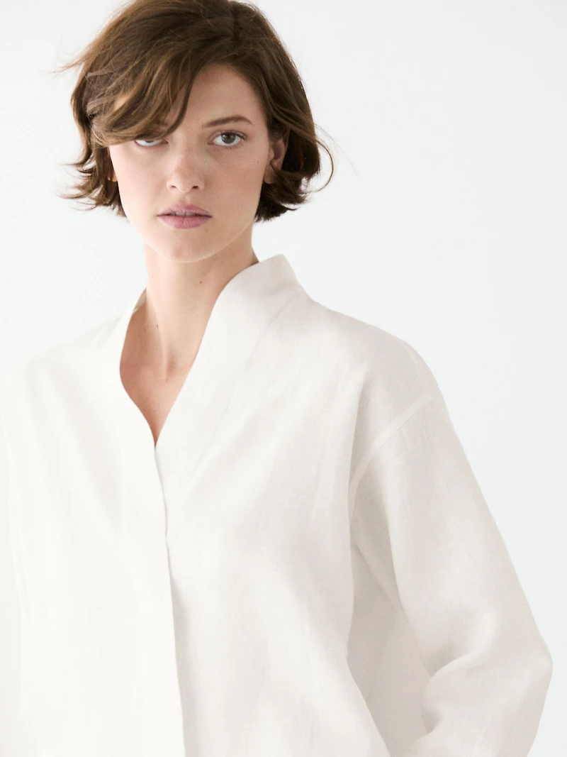 Flowing linen blouse with surplice neckline