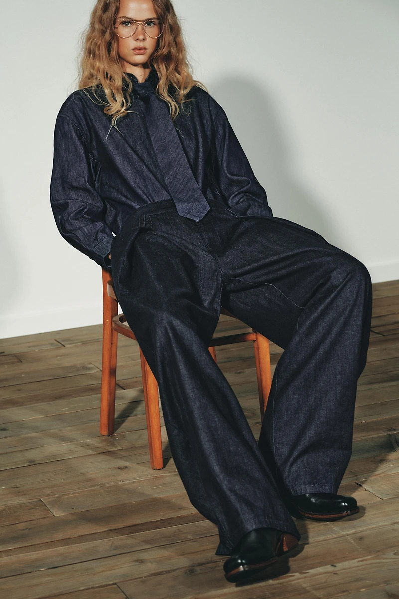 PLEATED FAUX DENIM PANTS