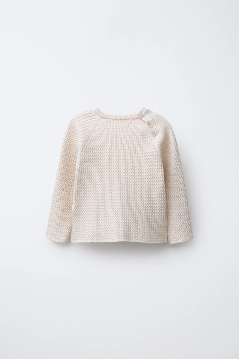 CABLE KNIT SWEATER