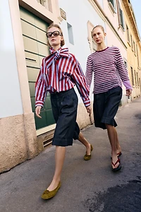 LONG PLEATED SHORTS