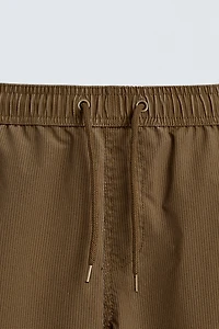 MAILLOT DE BAIN LONG À RAYURES DÉLAVÉES
