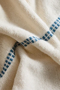 GEOMETRIC BORDER BATH TOWEL