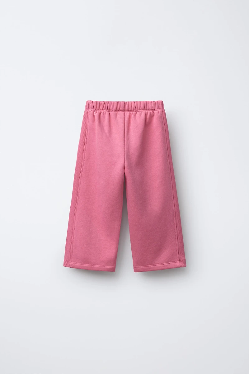 EMBROIDERED CAPYBARA WIDE LEG PLUSH PANTS