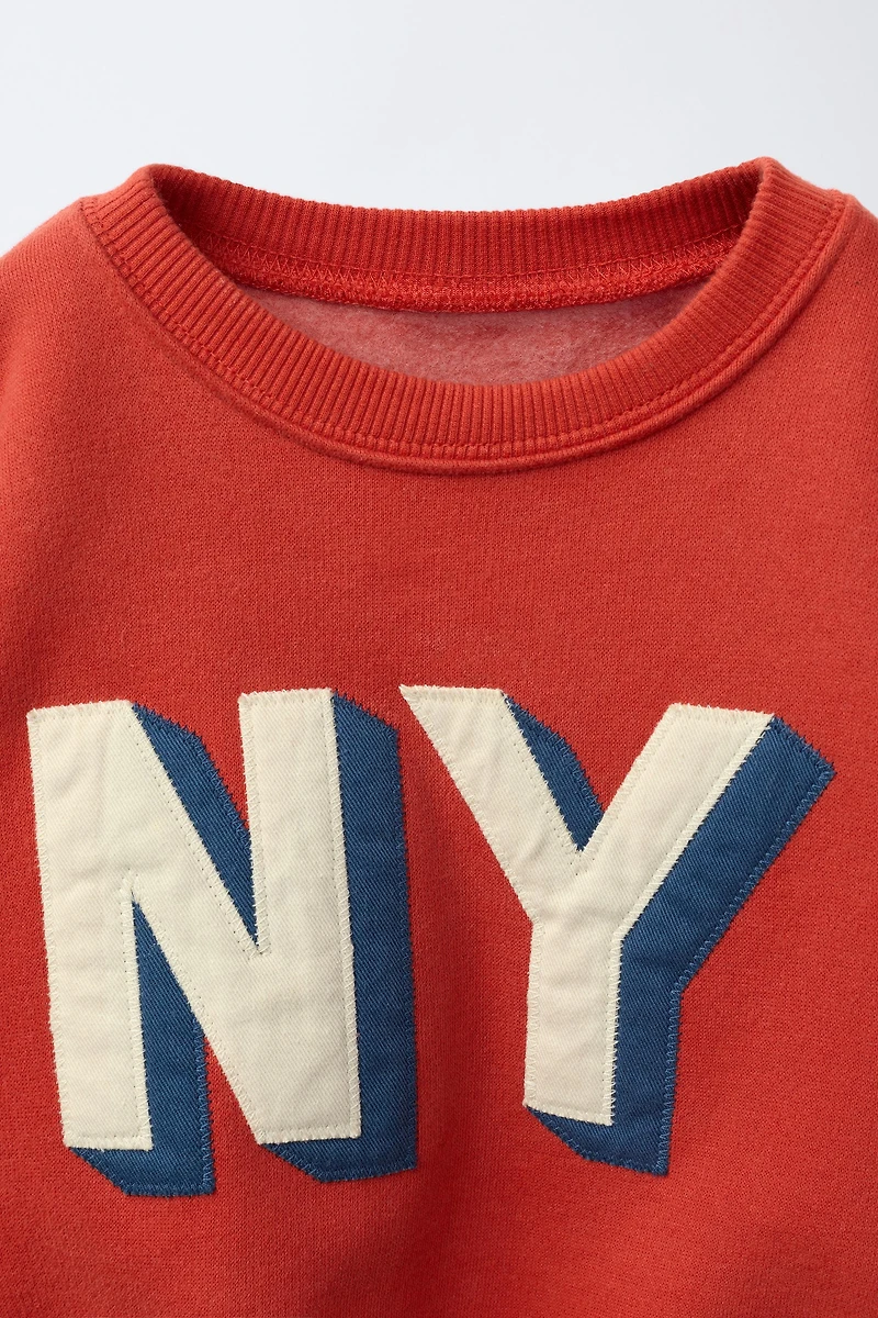 EMBROIDERED TEXT SWEATSHIRT