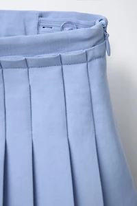 FLOWY PLEATED SKIRT