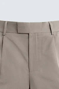 RELAXED FIT PLEATED SHORTS