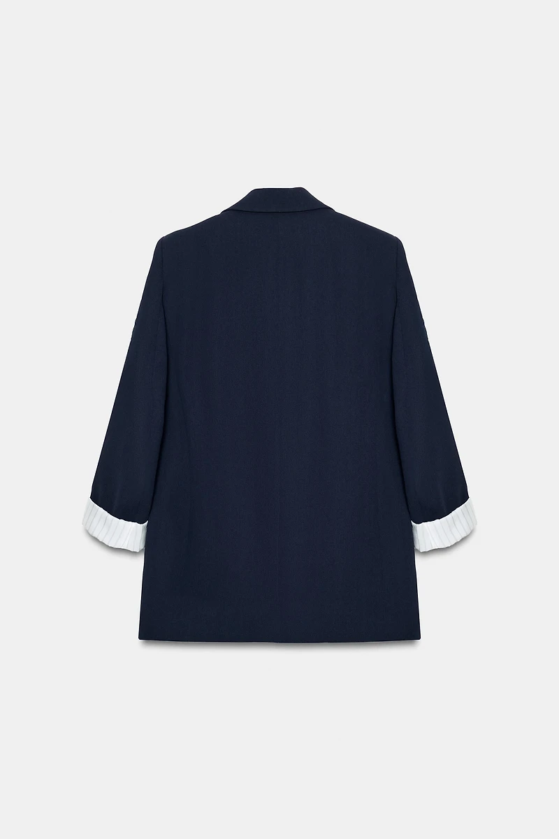 VESTE À MANCHES RETROUSSÉES ET POIGNETS IMPRIMÉS