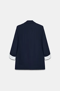 VESTE À MANCHES RETROUSSÉES ET POIGNETS IMPRIMÉS