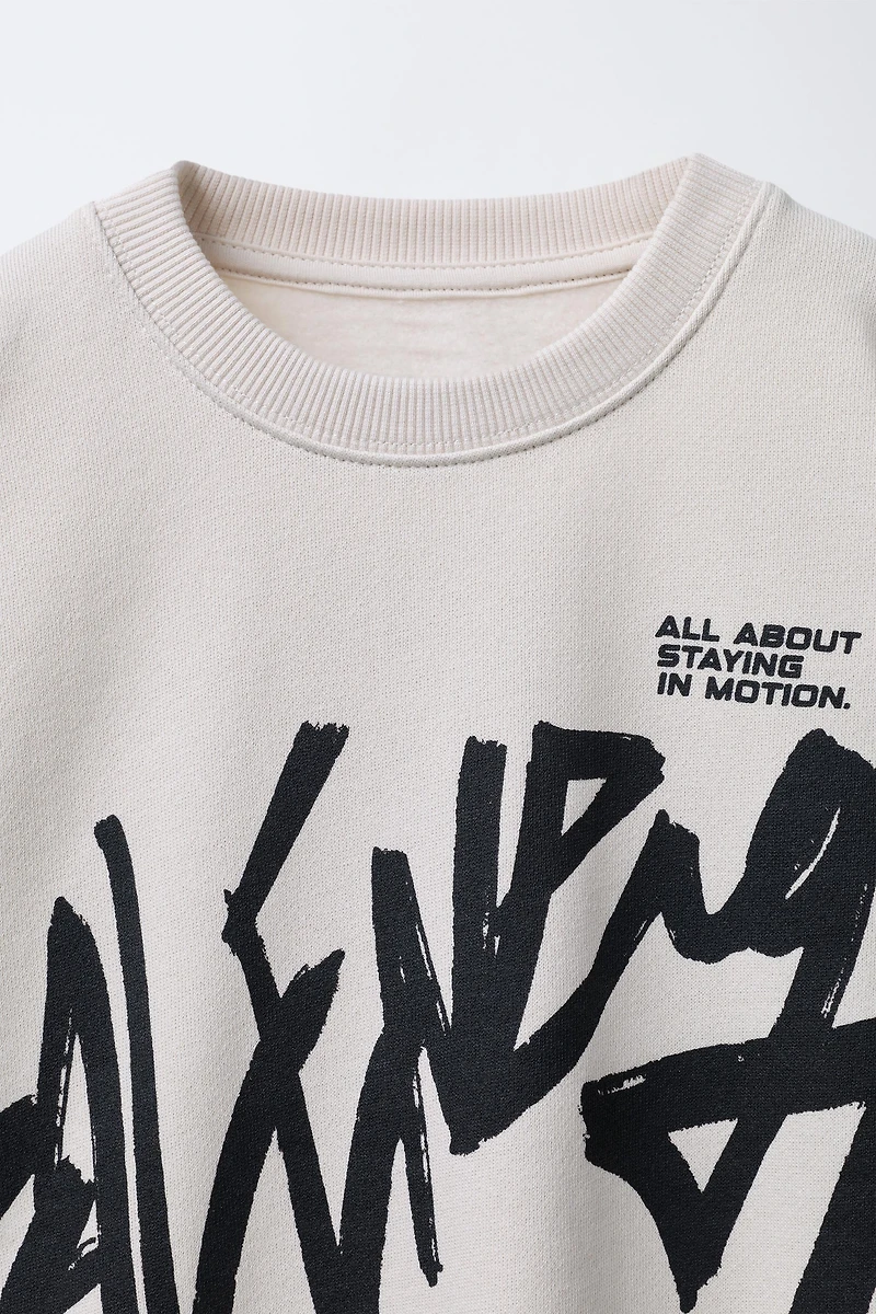 GRAFFITI PRINT SWEATSHIRT