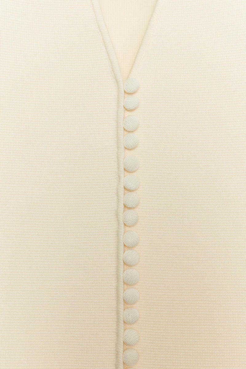 KNIT VEST TOP WITH COVERED BUTTONS