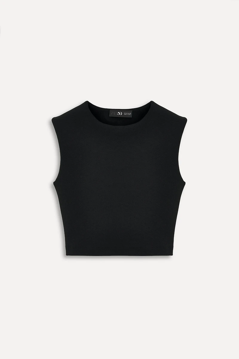 BUCKLED CROP TOP 50TH ANNIVERSARY